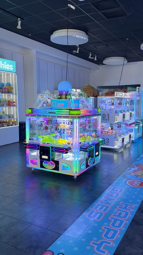 Rainbow-lit multiplayer claw machine